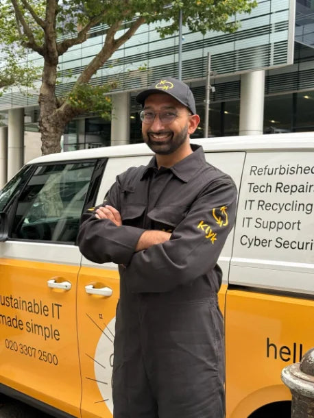Klyk engineer standing beside a Klyk electric van